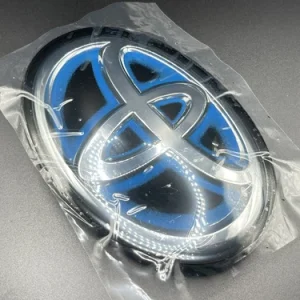 Toyota Highlander 2020-2024 Used OEM Radar-Compatible Grille Emblem hybrid style, radar/ACC compatible 53141-33140