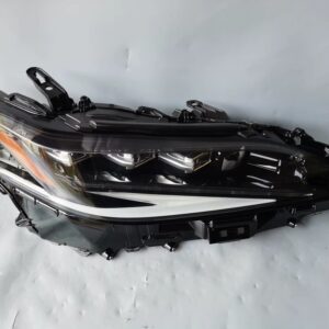 Genuine Lexus ES OEM LED headlight assembly front view - three LED projectors, LEXUS embossed lens and amber side reflector