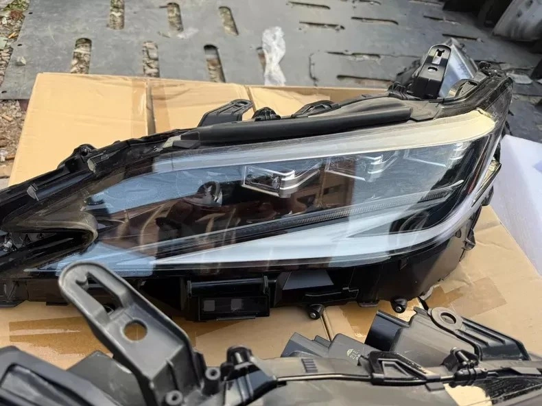 Lexus ES triple-beam LED headlight right angle view