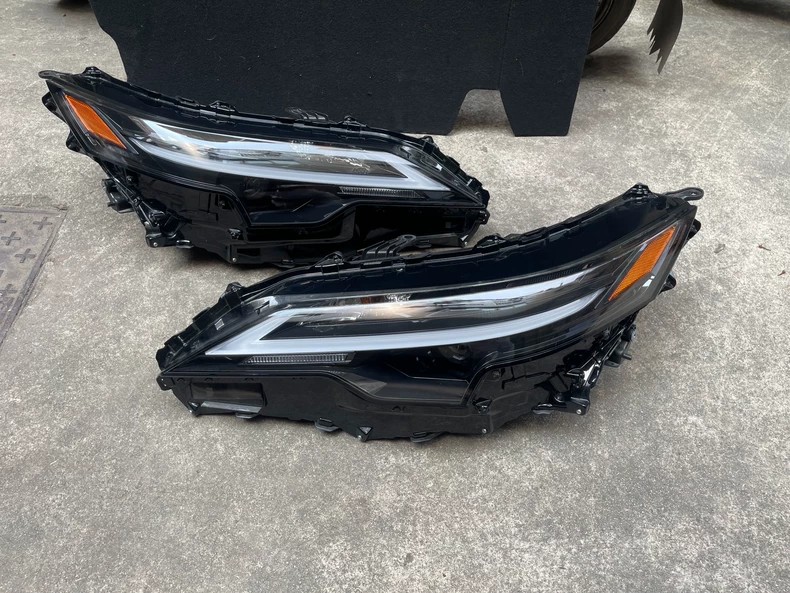 2025 Lexus RX350 RX350h RX450H used genuine OEM LED headlight assembly, left and right units front three-quarter view