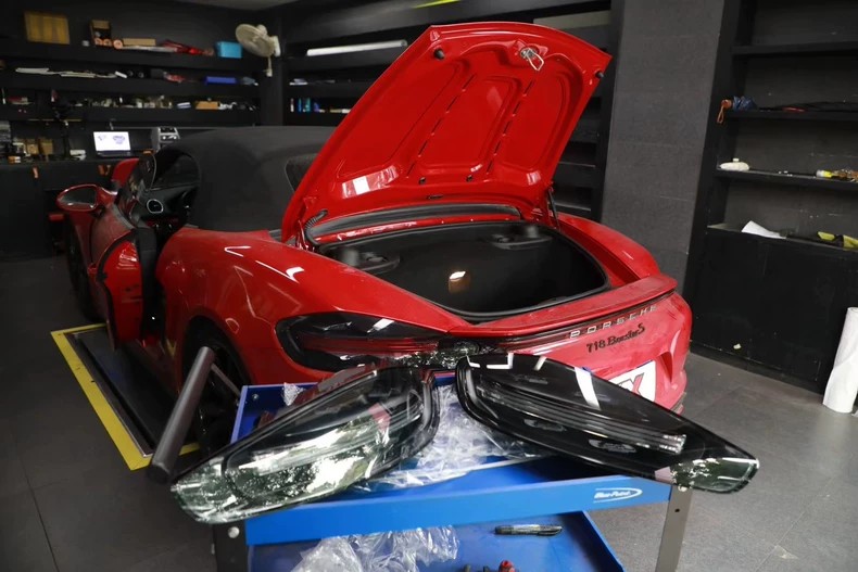 Porsche 718 Boxster S tail light, fitted unit and spare units